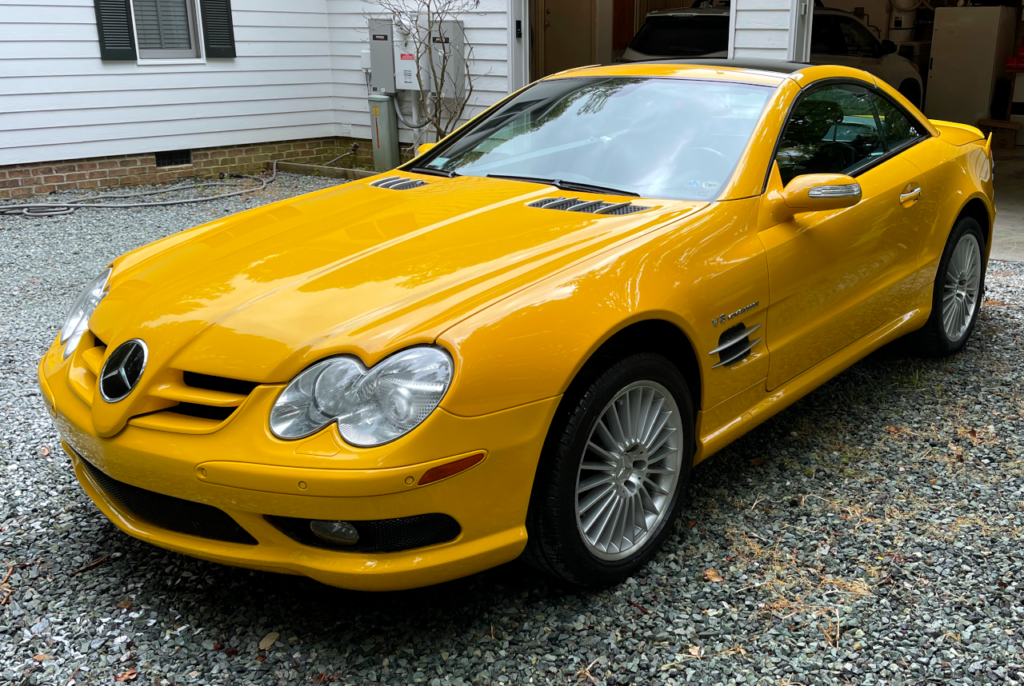 View of a clean yellow SL55 from the front left