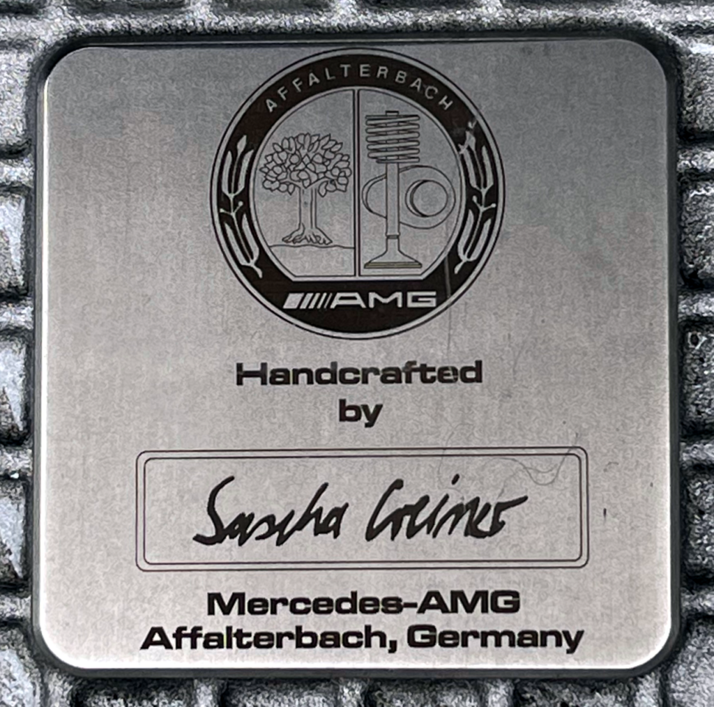 AMG plaque showing "Handcrafted by Sascha Greiner"